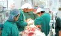 The surgery cuts two giant tumors on the patient's face