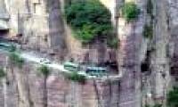 The tunnel runs through 1,700 m high cliffs, dug by hand for 5 years