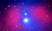 The two groups of galaxies are 100 trillion times the mass of the Sun