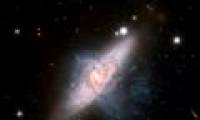 Unique picture of 2 galaxies colliding