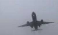 Video: See the plane landing in the thick fog