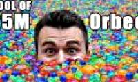 Video: What happens when you swim in a pool full of pearl beads?