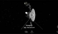 What is a spacecraft 23 billion kilometers from Earth doing?