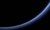 What is mysterious about Pluto's atmosphere?