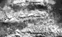 What's interesting at the highest peak of Moon Titan?