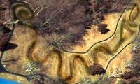 Who created the largest snake mound in the world?