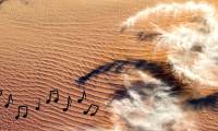 Why can some deserts make strange sounds?