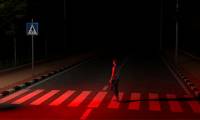 Why did Denmark change road lights to red?