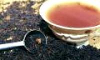 Why do British people often give milk to tea?