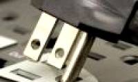 Why do electrical plugs have to be designed with 3 legs for cumbersome?