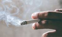 Why do many longtime smokers not get lung cancer?