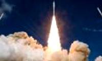 Why is the rocket engine still burning out of space even without oxygen?