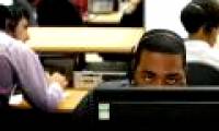 Why should office workers stand up from their working chairs for at least 2 hours a day?