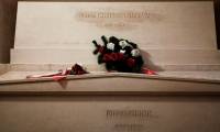 Why was Marie Curie buried in a lead-lined coffin?